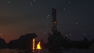 A Minecraft scene with a dark tower, lava, and a starry sky.